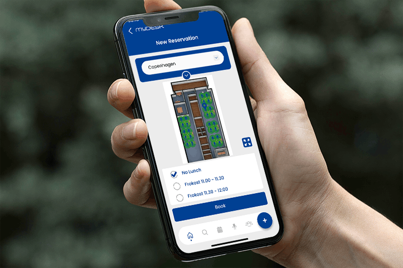 Deskbooking - MyDesk mobile in hand