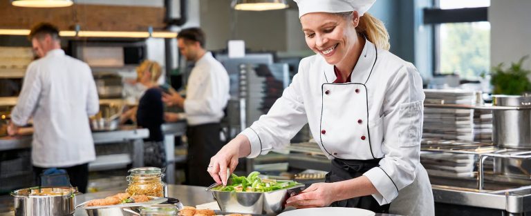 Chef prepare lunch at office canteen
