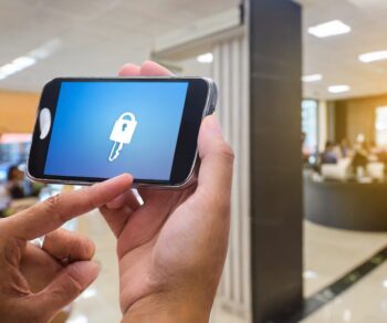 Digital key on mobile phone in office reception