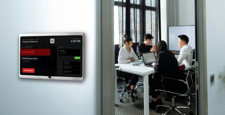 Meeting room device on wall