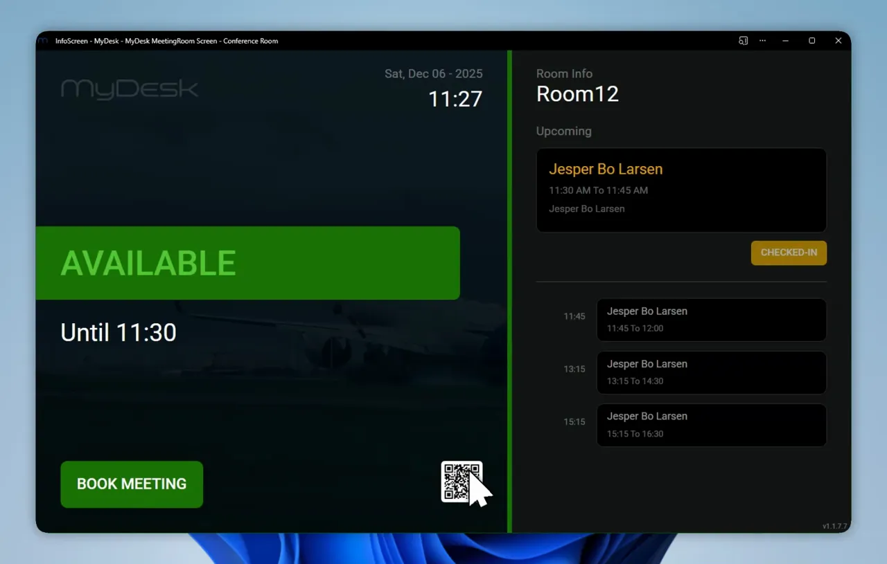 MyDesk meeting room screen with QR code and cursor pointing to it